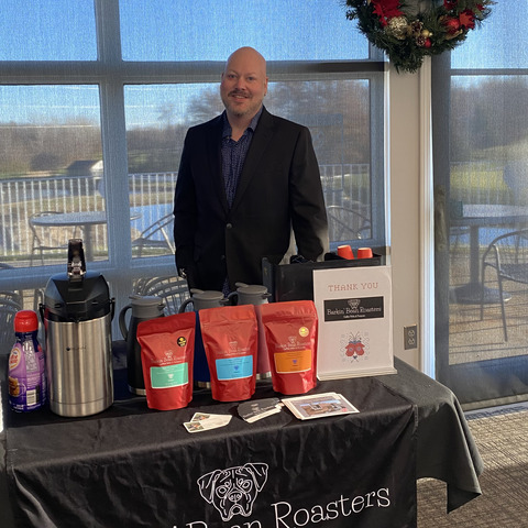 Serving coffee at the Chamber holiday networking event